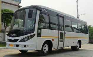 Exteriors of a white 30 seater Bus